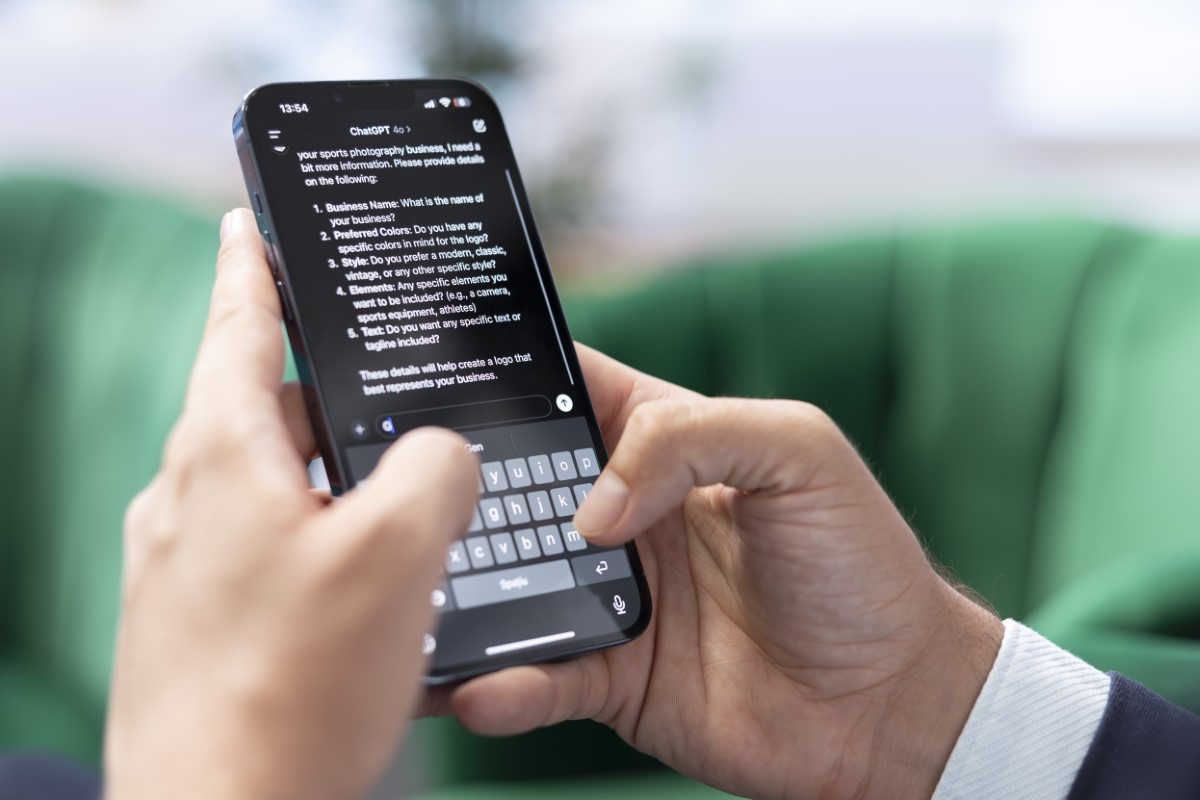 Bucharest, Romania – July 30th 2024 – Man typing prompts into an AI powered chat