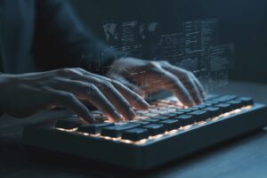 hacker-using-computer-keyboard-with-data-visualization IA artificial – FreePik