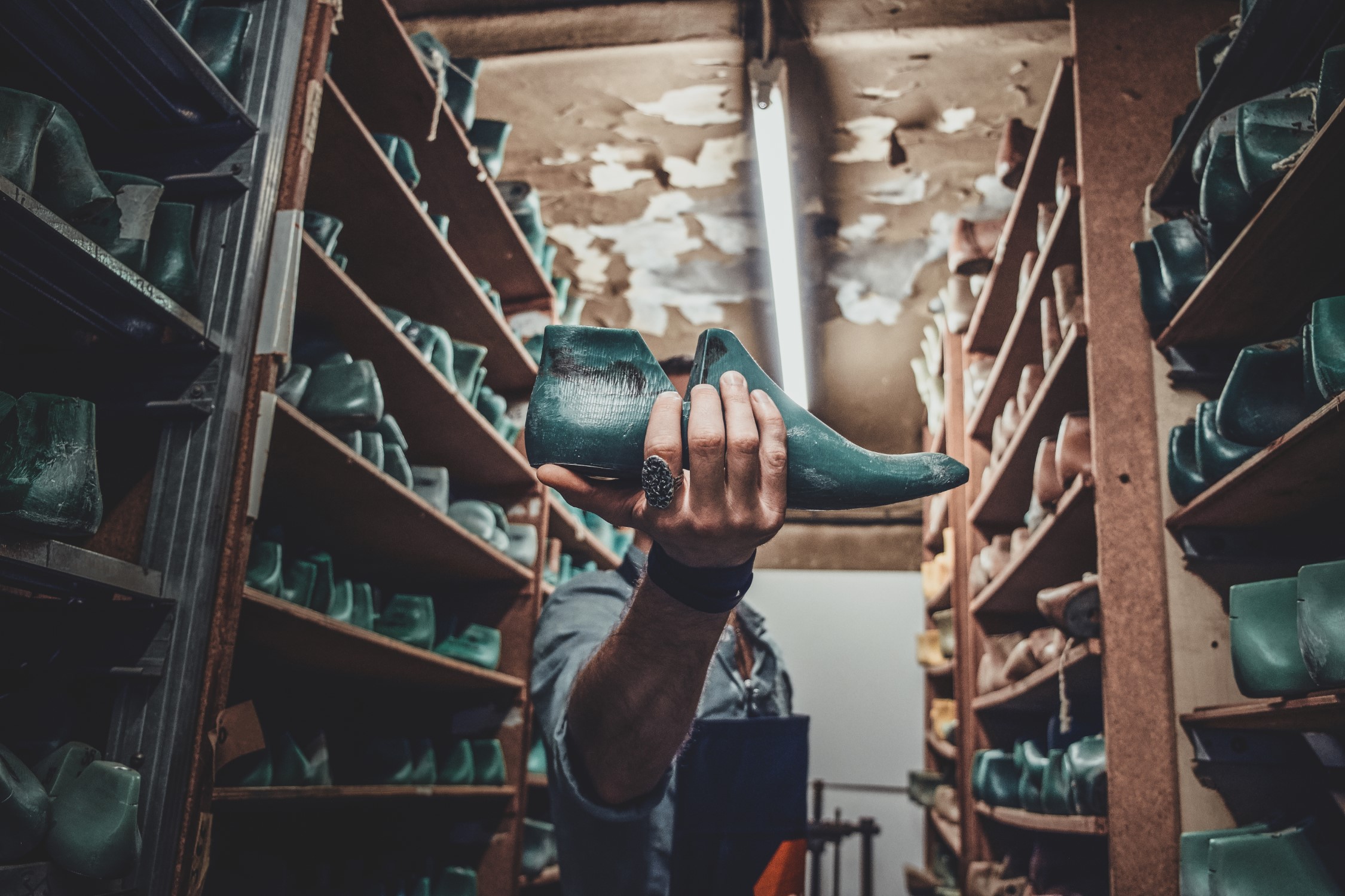 Cobbler foung shoe form at his storage